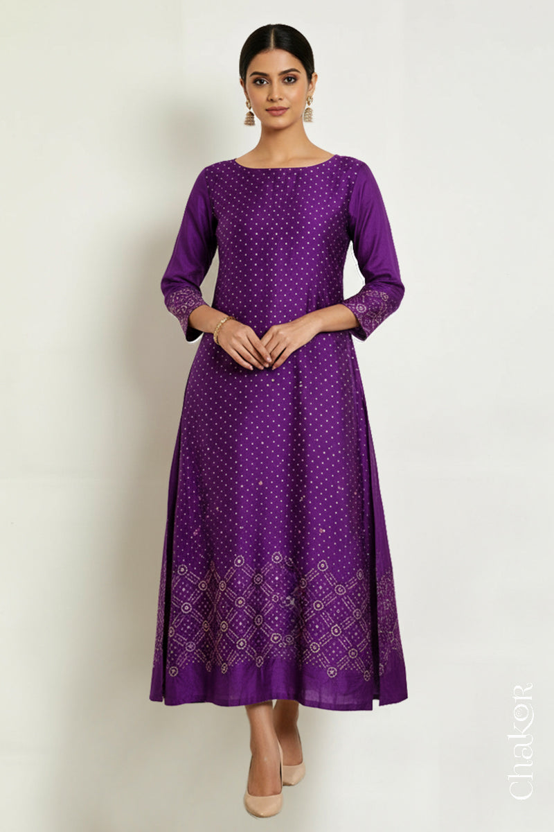 Purple mulberry silk Bandhani (Rai Bandhej) kurta stitched from the fabric, featuring all-over white and mustard butis and a mirror-work hem border – CHAKOR
