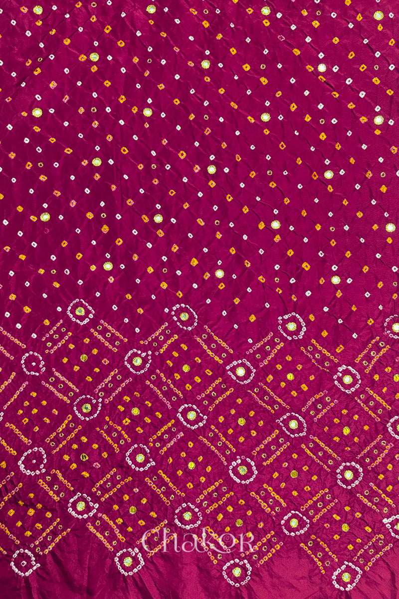 Rani Pink mulberry silk Bandhani (Rai Bandhej) fabric showing full layout with white and yellow tie-dye butis, geometric bandhej pattern, and golden zari mirror & sequins embroidery – CHAKOR.