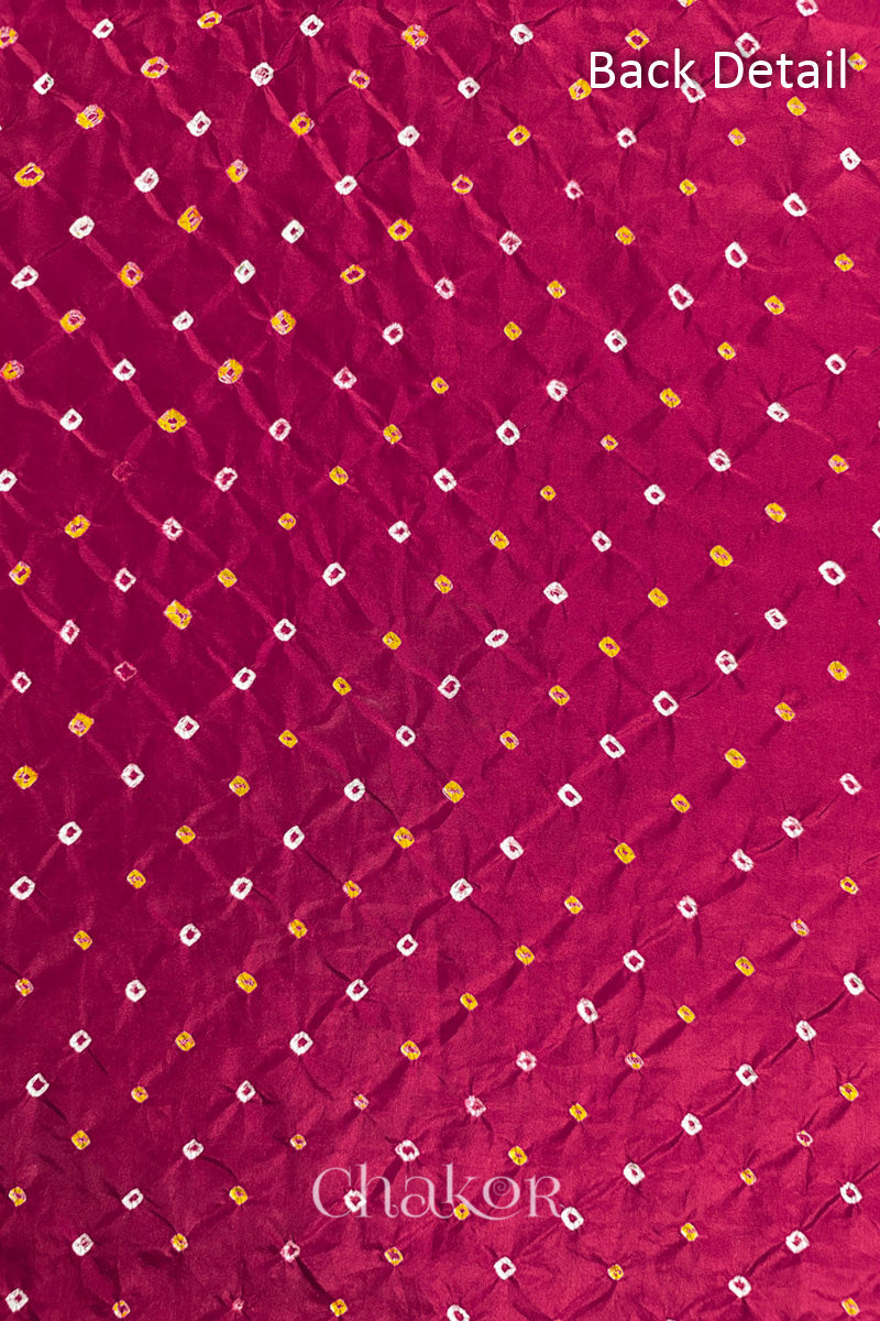 Back detail of Rani Pink mulberry silk Bandhani (Rai Bandhej) fabric with white and yellow tie-dye butis in an all-over pattern – CHAKOR.
