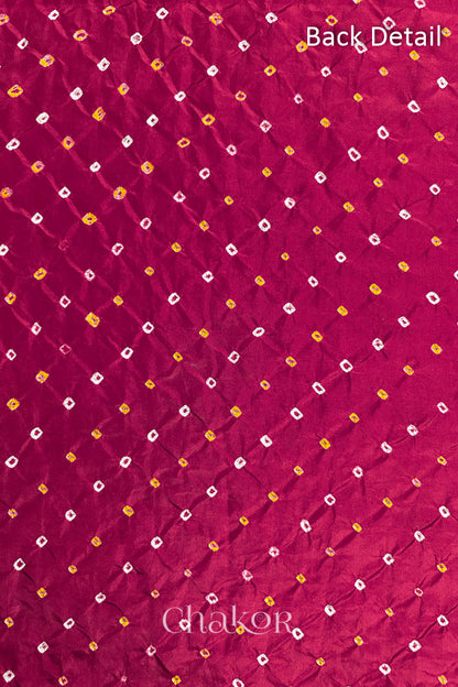 Back detail of Rani Pink mulberry silk Bandhani (Rai Bandhej) fabric with white and yellow tie-dye butis in an all-over pattern – CHAKOR.