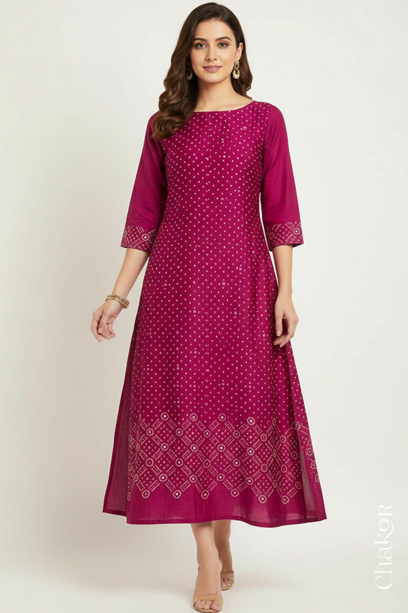 Rani Pink mulberry silk Bandhani (Rai Bandhej) dress stitched from the fabric, featuring all-over white and yellow butis and a geometric mirror-work hem border – CHAKOR