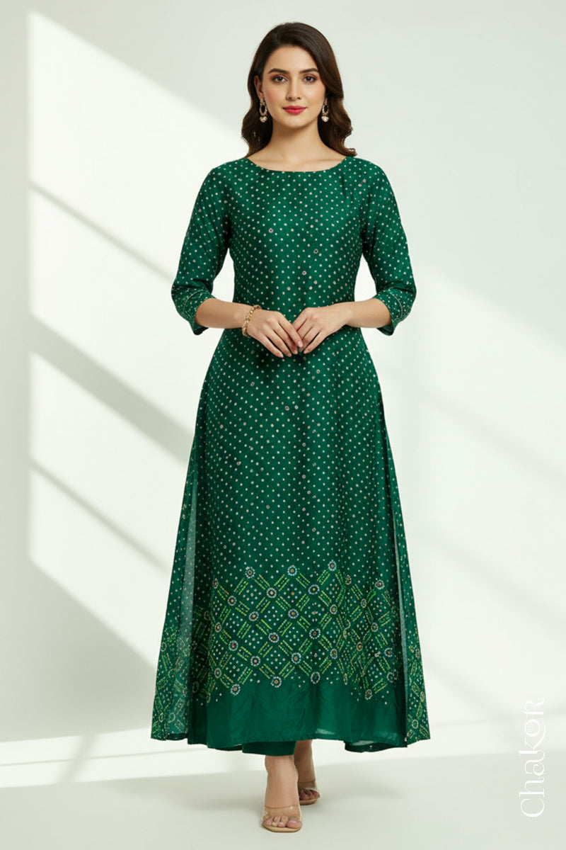 Green mulberry silk Bandhani (Rai Bandhej) kurta stitched from the fabric, featuring all-over white and mustard butis and a geometric mirror-work border – CHAKOR