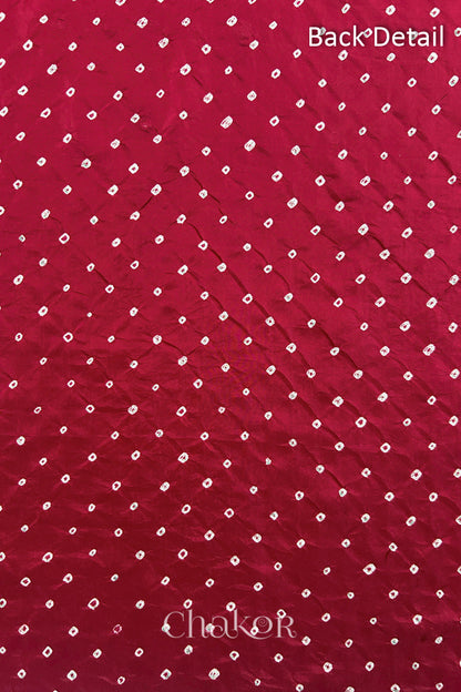 Back detail of Deep Red mulberry silk Bandhani (Rai Bandhej) fabric with white tie-dye dots in an all-over pattern – CHAKOR.
