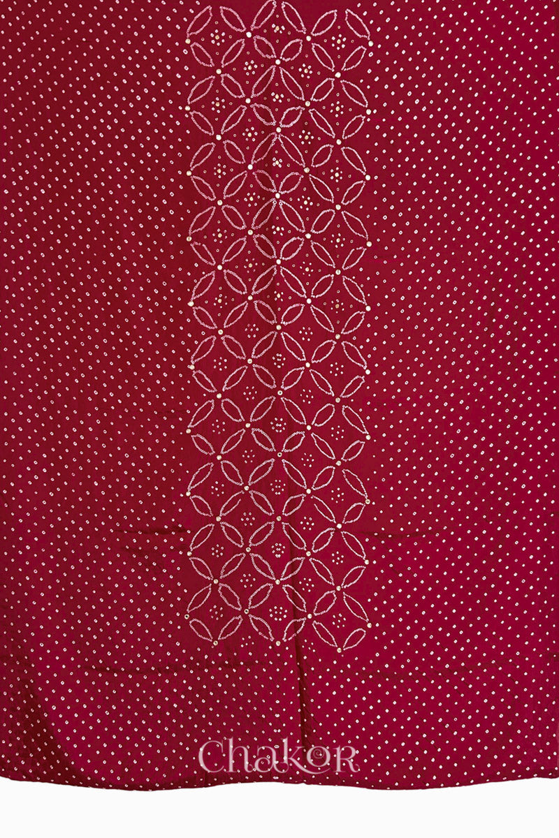 Full fabric panel of Deep Red mulberry silk Bandhani (Rai Bandhej) with all-over white dots and a floral border with golden zari mirror & sequins embroidery – CHAKOR.
