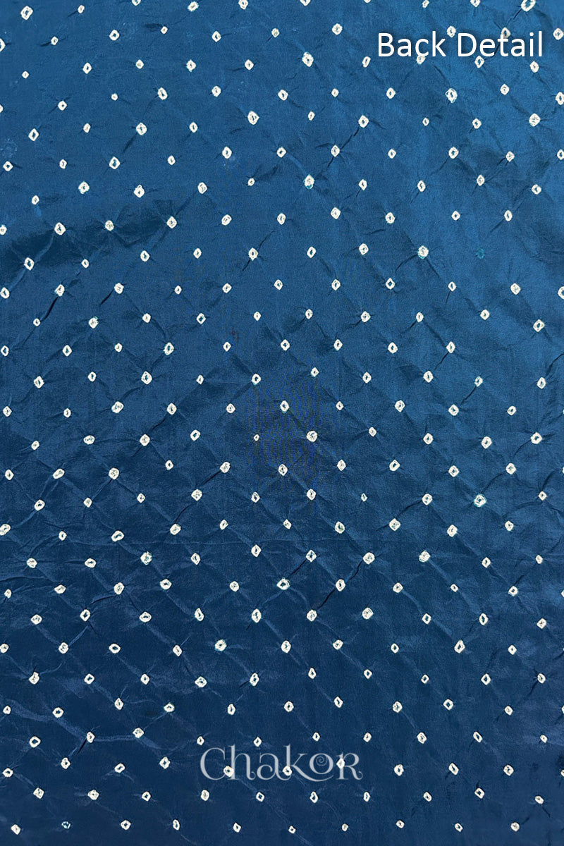 Back detail of Indigo Blue mulberry silk Bandhani (Rai Bandhej) fabric with white tie-dye butis in an all-over pattern – CHAKOR.
