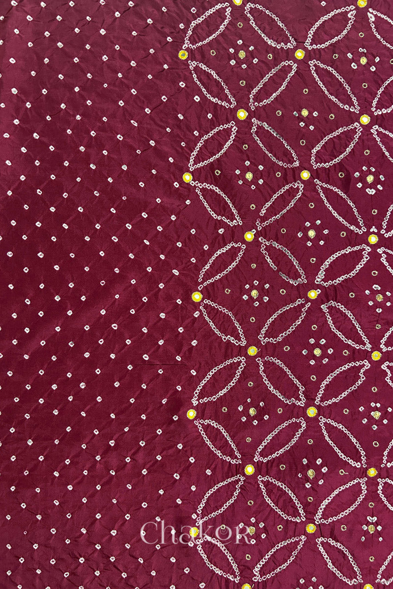 Dusty Red mulberry silk Bandhani (Rai Bandhej) fabric showing full layout with white tie-dye dots, floral bandhej pattern, and yellow with zari mirror & sequins embroidery – CHAKOR.
