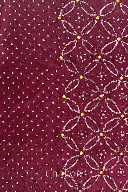 Dusty Red mulberry silk Bandhani (Rai Bandhej) fabric showing full layout with white tie-dye dots, floral bandhej pattern, and yellow with zari mirror & sequins embroidery – CHAKOR.
