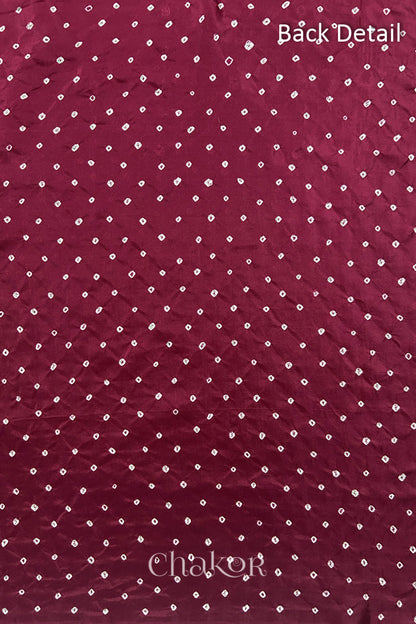 Back detail of Dusty Red mulberry silk Bandhani (Rai Bandhej) fabric with white tie-dye dots in an all-over pattern – CHAKOR.
