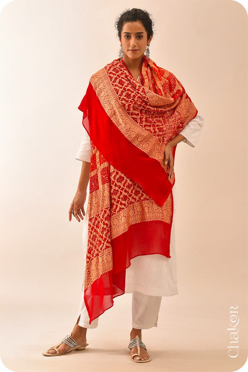 Chakor's Traditional Orange Red shaded Gharchola Bandhani Banarasi Georgette Silk Dupatta.