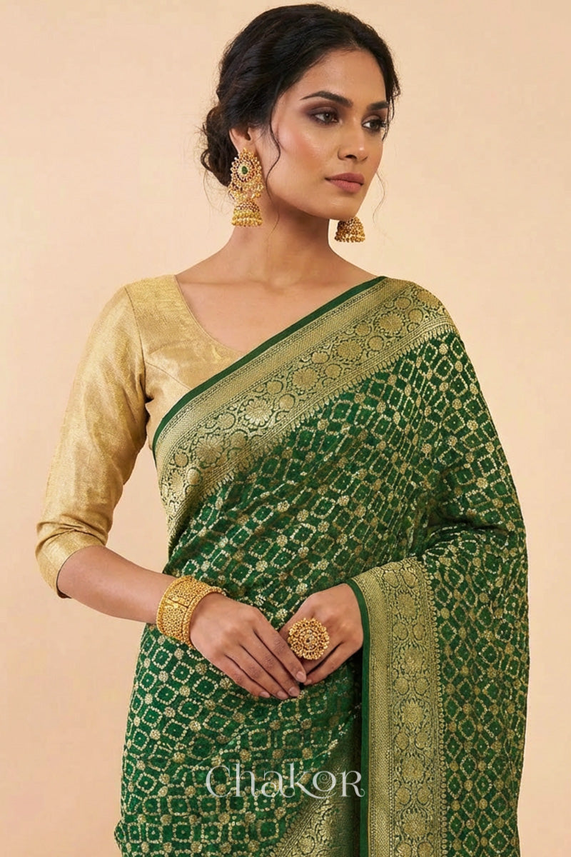 Woman wearing Handcrafted Green Bandhani Banarasi Georgette Saree in pure silk featuring zari weaving and Kutch Bandhej for weddings and occasions.