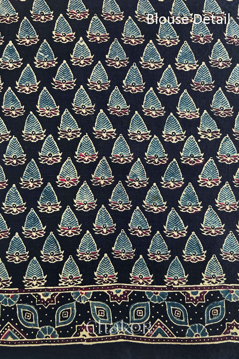 Blouse Material of Pink Bandhani Saree with Black Ajrakh printed border and pallu in pure gaji silk with traditional bandhej tie-dye, handcrafted in Kutch. 