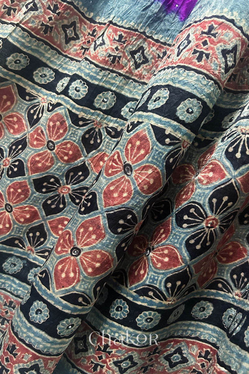 Close-up of Ajrakh printed pallu on magenta Bandhani gaji silk dupatta.