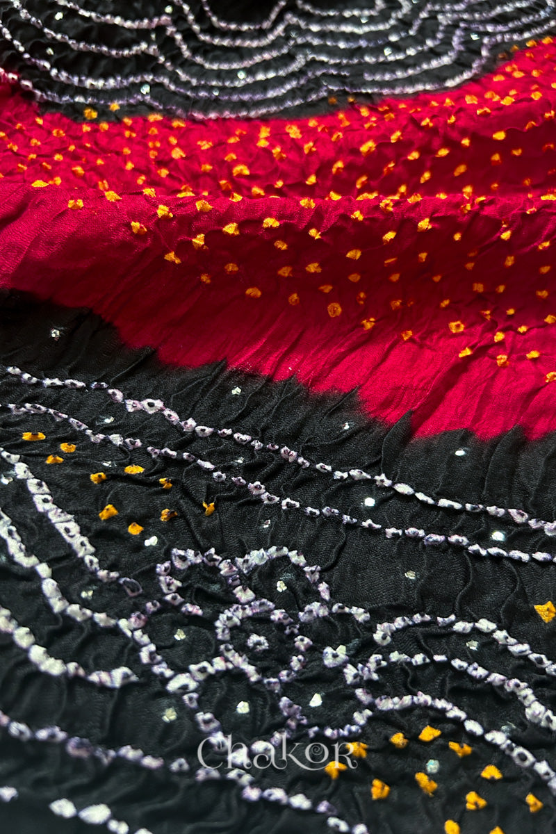 Closeup of Red black bandhani gaji silk dupatta with mukaish embroidery & tassels handcrafted in kutch - CHAKOR.