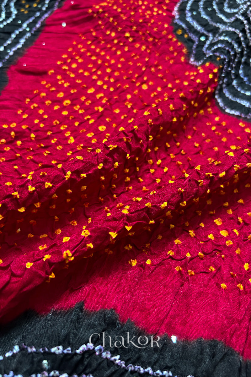 Closeup of Red black bandhani gaji silk dupatta with mukaish embroidery & tassels handcrafted in kutch - CHAKOR.
