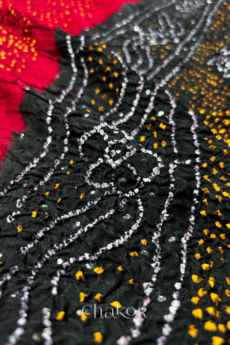 Close-up of Red black bandhani gaji silk dupatta with mukaish embroidery & tassels handcrafted in kutch - CHAKOR.