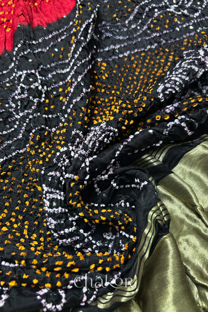 Close-up of Red black bandhani gaji silk dupatta with mukaish embroidery & tassels handcrafted in kutch - CHAKOR.