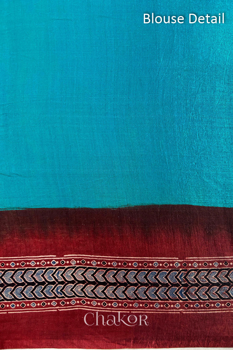Blouse Material of Peacock Blue Bandhani Saree with Natural Red Ajrakh printed border and pallu in pure gaji silk with traditional bandhej tie-dye, handcrafted in Kutch. 