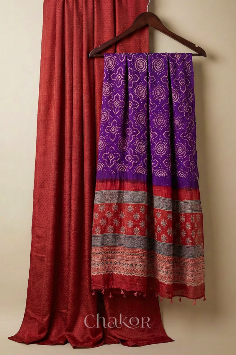 Brick red mashru kurta fabric with purple bandhani gaji silk embroidered dupatta and ajrakh pallu. 