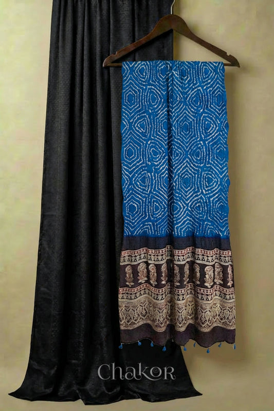Black mashru kurta set fabric paired with blue bandhani gaji silk dupatta with ajrakh pallu.
