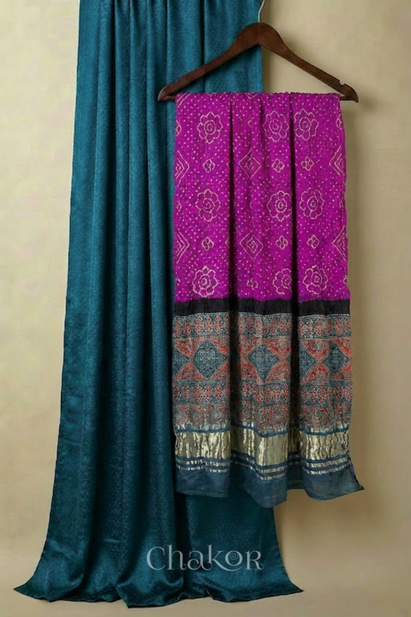 Dark Indigo mashru kurta fabric paired with magenta pink bandhani gaji silk dupatta featuring ajrakh printed pallu.