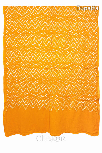 Full view of the dupatta from the kurta set with intircate zigzag bandhani patterns,  with Chakor logo. The design showcases artisanal craftsmanship.