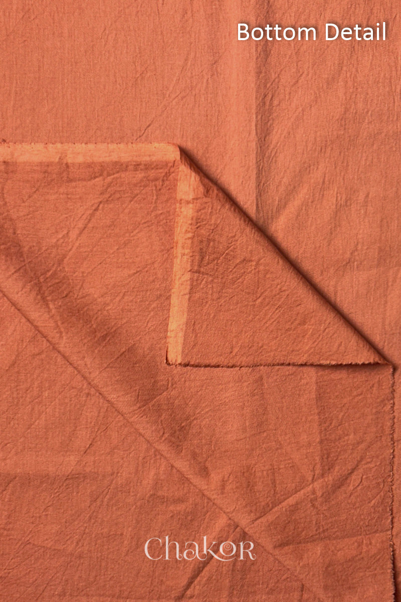 Plain Brick Orange cotton bottom fabric included in the unstitched suit set.
