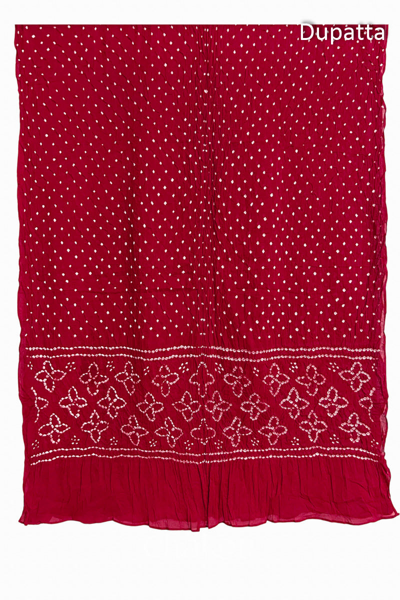 Full view of Red Bandhani mulmul cotton dupatta with floral pallu and dotted body pattern.
