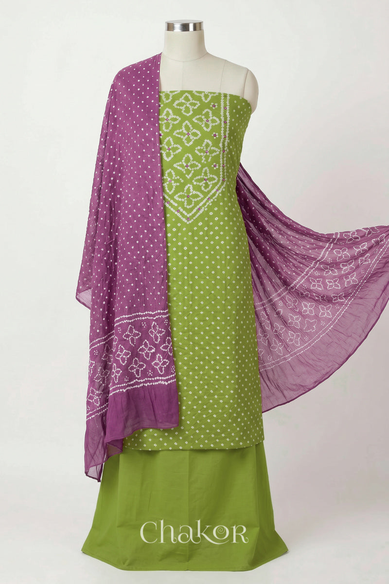 Green Kutch Bandhani cotton unstitched suit set, mirror work kurta with Mauve mulmul cotton dupatta.
