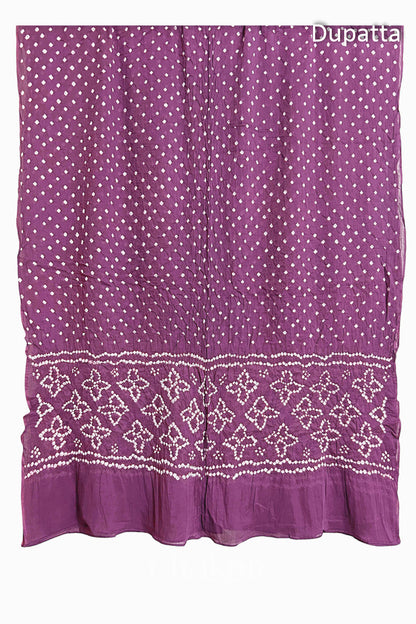 Full view of Mauve Bandhani mulmul cotton dupatta with floral pallu and dotted body pattern.
