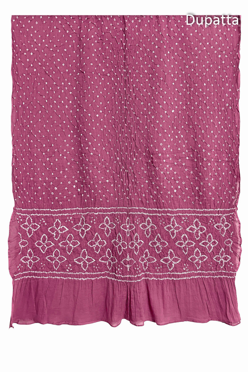 Full view of Old Rose Bandhani mulmul cotton dupatta with floral pallu and dotted body pattern.
