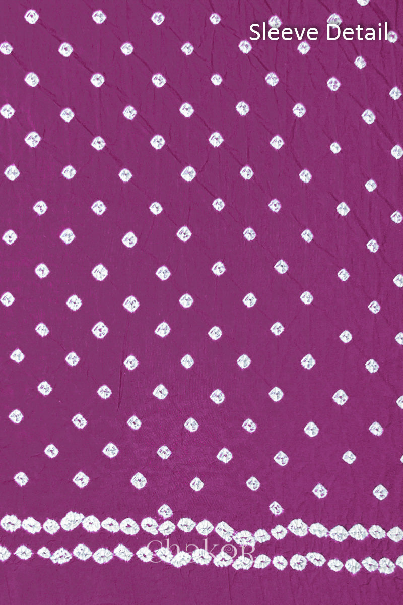 Bandhani dotted sleeve pattern on mercerised cotton fabric with handcrafted tie dye work.
