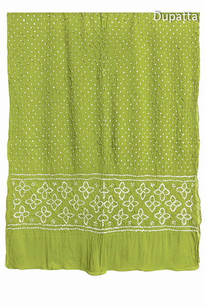 Full view of Lime Green Bandhani mulmul cotton dupatta with floral pallu and dotted body pattern.
