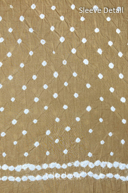 Bandhani dotted sleeve pattern on mercerised cotton fabric with handcrafted tie dye work.
