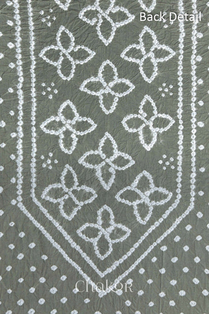 Back yoke detail featuring traditional Bandhani floral motifs on Grey cotton fabric.
