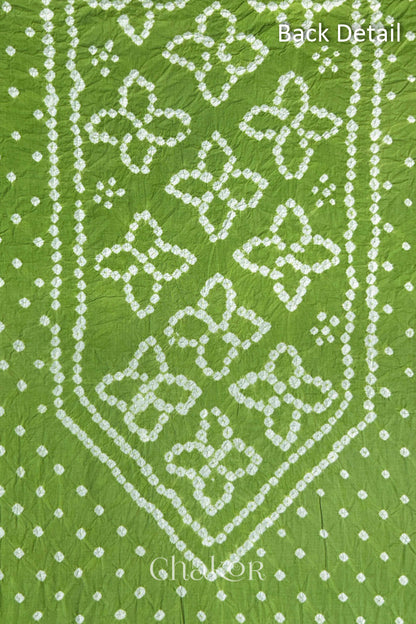Back yoke detail featuring traditional Bandhani floral motifs on Green cotton fabric.
