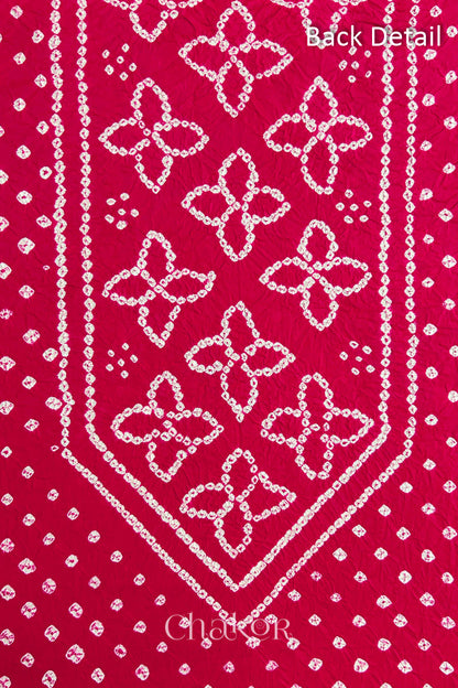 Back yoke detail featuring traditional Bandhani floral motifs on Strawberry Pink cotton fabric.
