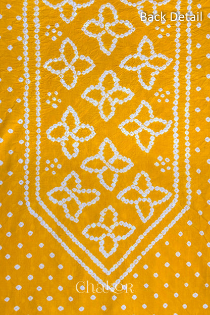 Back yoke detail featuring traditional Bandhani floral motifs on Yellow cotton fabric.
