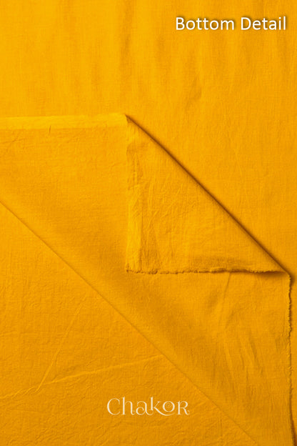 Plain Yellow cotton bottom fabric included in the unstitched suit set.
