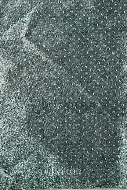 Charcoal grey mashru self textured fabric with 'Chakor' logo visible.
