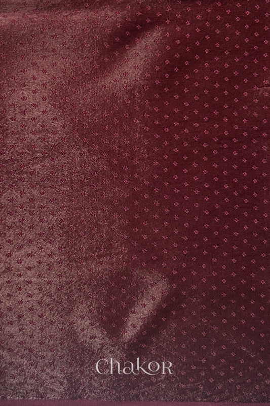 maroon mashru self textured fabric with 'Chakor' logo visible.

