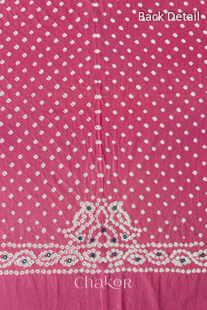 Popat Bandhani parrot motif and mirror work designed for the back of a Pink blouse.
