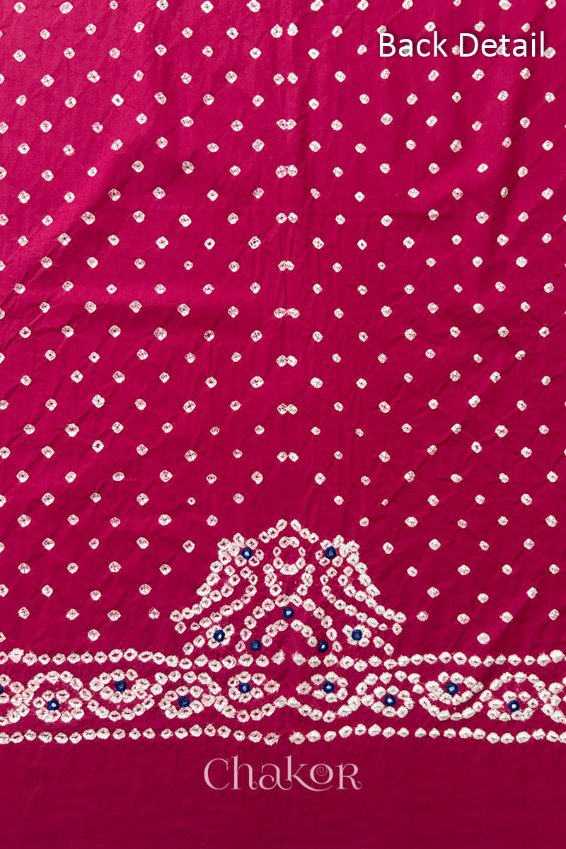 Popat Bandhani parrot motif and mirror work designed for the back of a Strawberry pink blouse.
