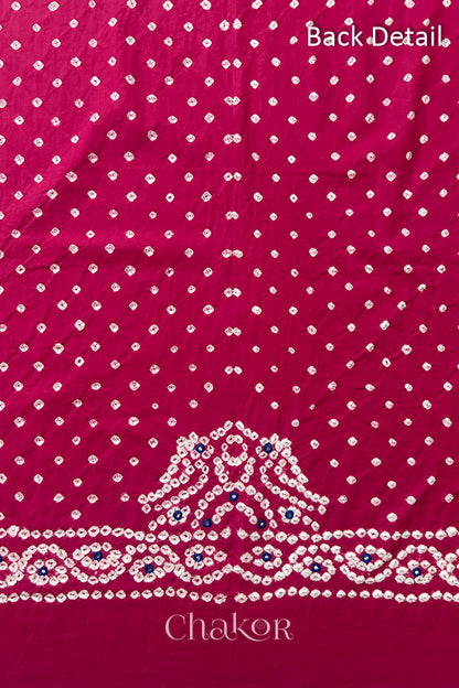 Popat Bandhani parrot motif and mirror work designed for the back of a Strawberry pink blouse.
