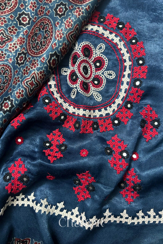 Natural dyed indigo Ajrakh printed Mashru silk-cotton blouse material with  Traditional Kutch hand embroidery and mirror work for sleeves.