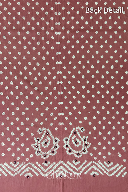 Close-up of Old Rose Kutch Bandhani fabric with white dotted pattern and Keri motifs for back.
