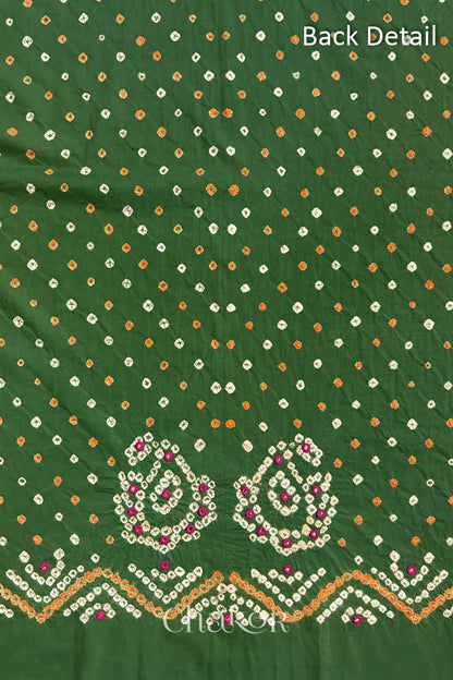 Close-up of Mehendi Green Kutch Bandhani fabric with white dotted pattern and Keri motifs for back.

