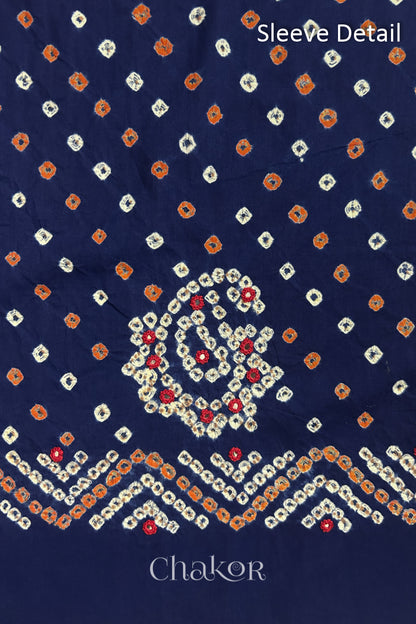 Navy Kutch Bandhani cotton fabric with white tie-dye dots and Keri motif detail for sleeves.
