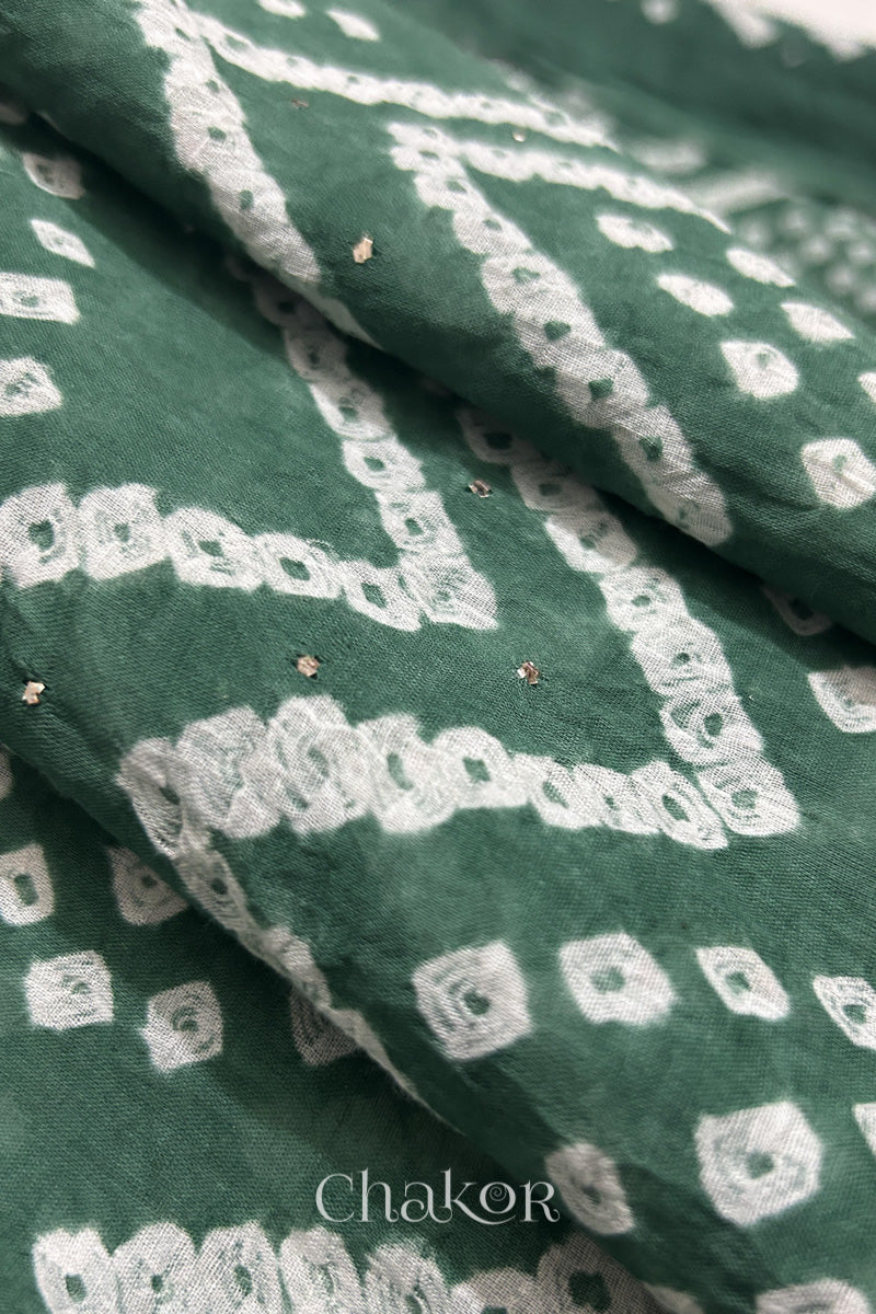 Close up of Traditional hand tied Bandhani pattern on Moss green mulmul cotton dupatta.
