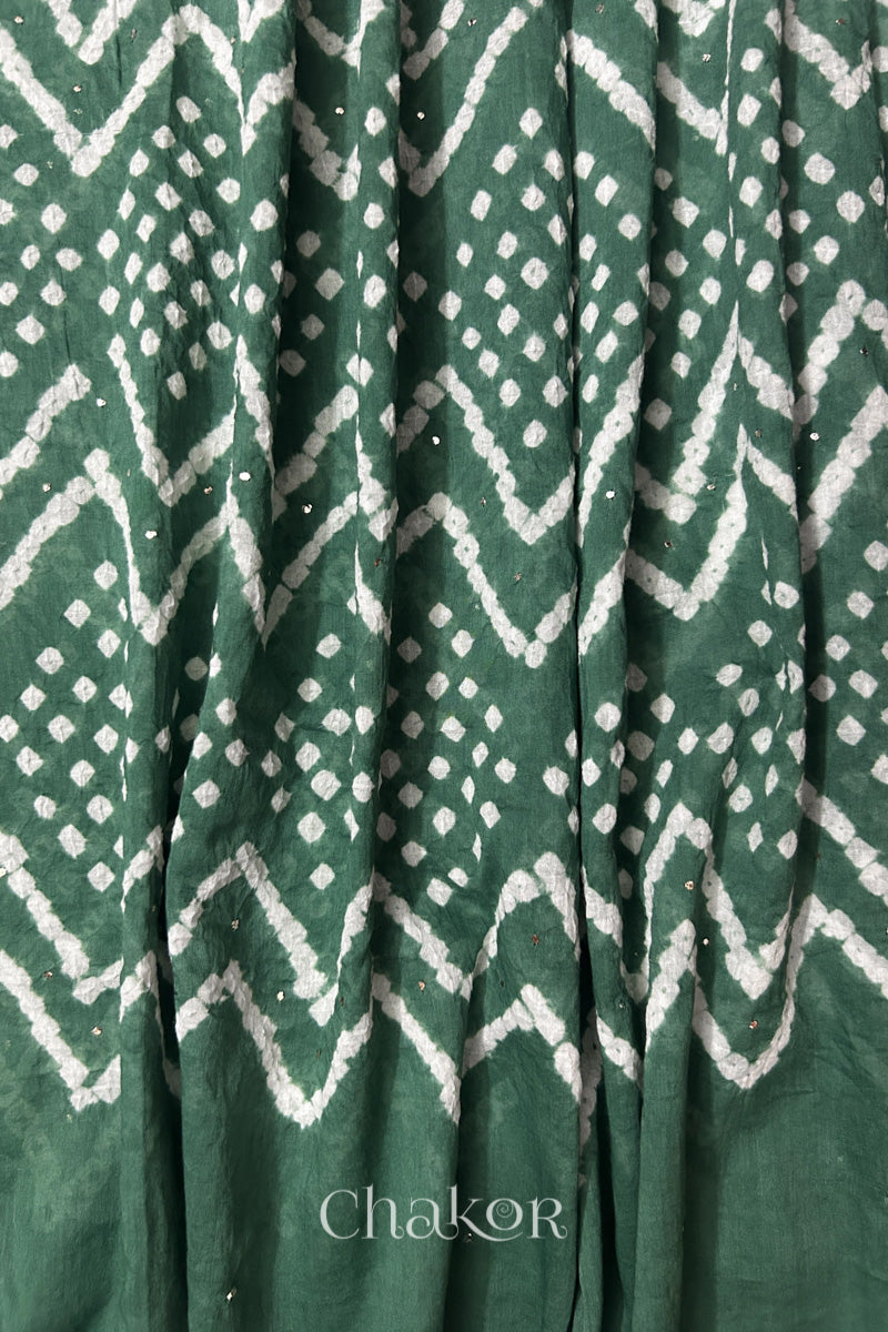 Detailed view of Bandhani tie-dye pattern and fabric fall on Moss green cotton dupatta.
