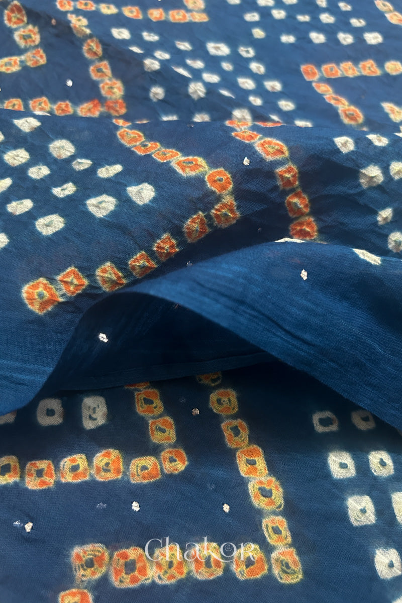 Detailed view of Bandhani tie-dye pattern and fabric fall on Indigo Blue cotton dupatta.
